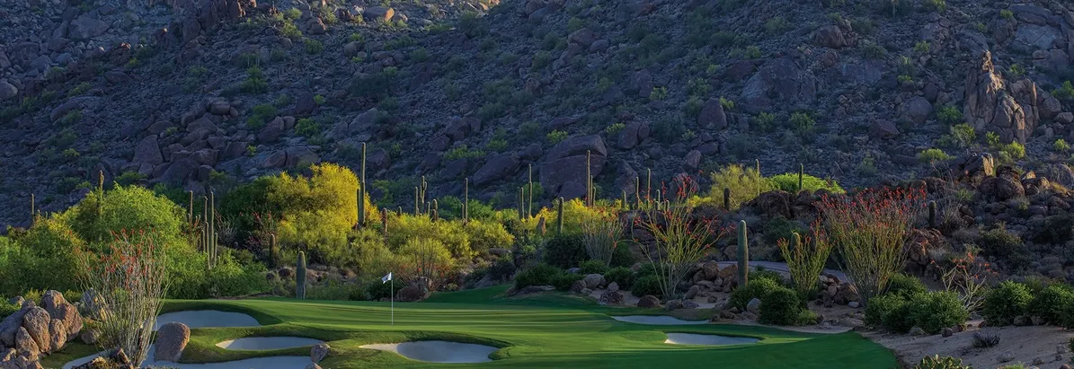 A green and flagstick at Deacon's Lodge